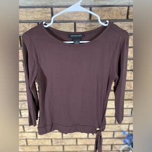 Harold’s brown blouse